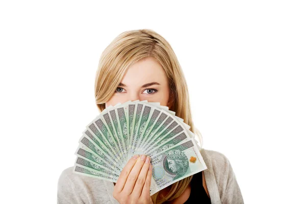 Жінка з польськими грошима — стокове фото
