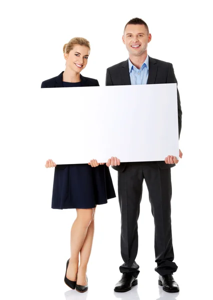 Business-Team mit einem Banner — Stockfoto