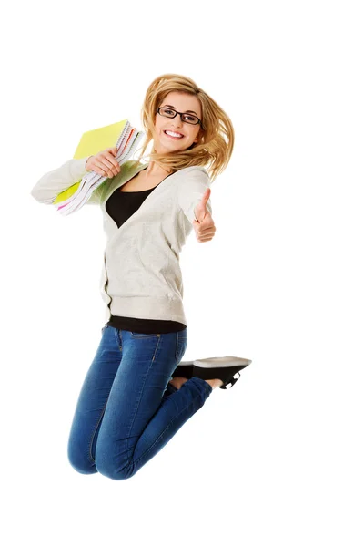 Young casual woman, student jumping. — Stock Photo, Image