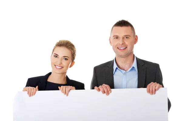 Equipe de negócios com um banner — Fotografia de Stock