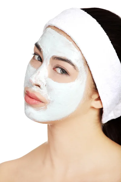 Relaxed woman with a nourishing face mask — Stock Photo, Image