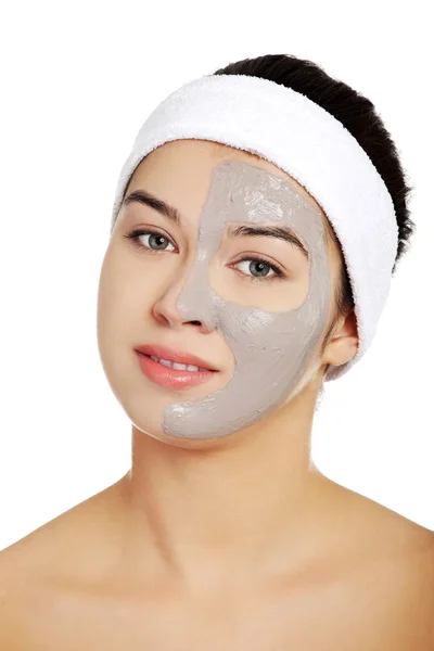 Relaxed woman with a nourishing face mask — Stock Photo, Image