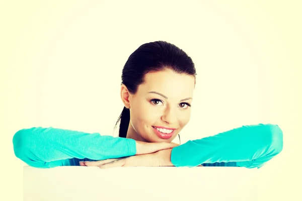 Portrait young happy woman with blank board — Stock Photo, Image