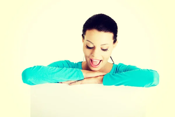 Portrait young happy woman with blank board — Stock Photo, Image