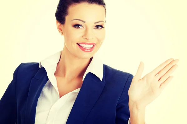 Mujer de negocios haciendo elegir con su palma — Foto de Stock