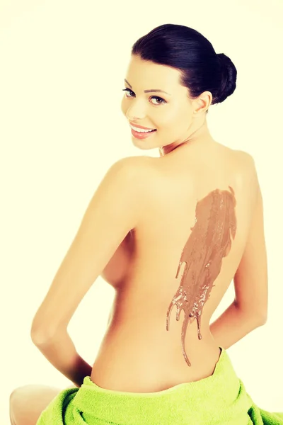 Spa saloon- chocolate massage. — Stock Photo, Image