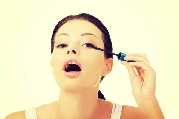 Donna viso con pennello mascara — Foto Stock