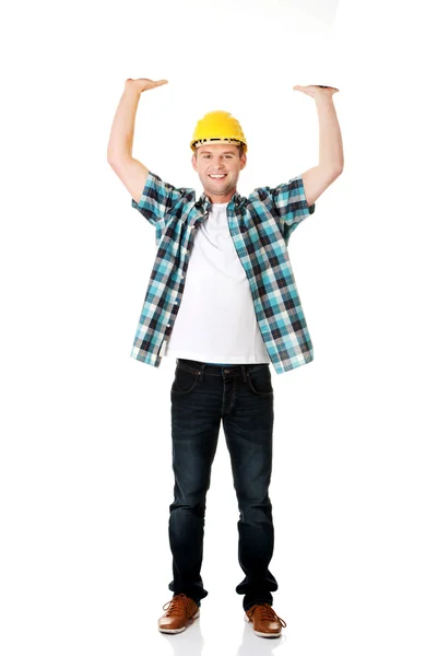 Happy worker presenting empty banner. — Stock Photo, Image