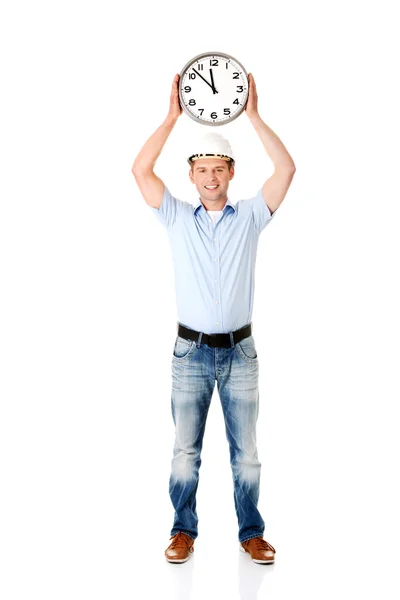 Businessman wearing helmet with clock — Stock Photo, Image