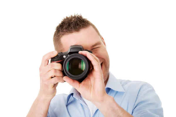 Hombre fotógrafo con DSLR — Foto de Stock