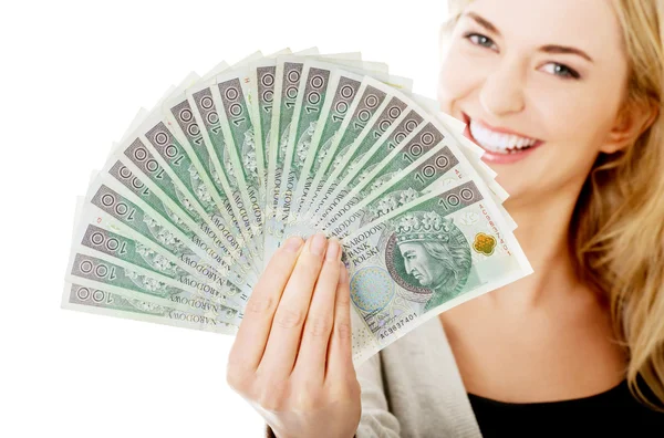 Vrouw met Pools geld — Stockfoto