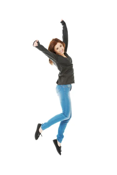 Giovane donna casuale, studente che salta . — Foto Stock