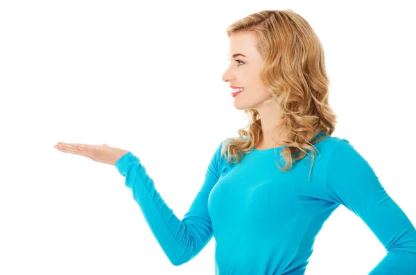 Woman showing something or copyspase — Stock Photo, Image