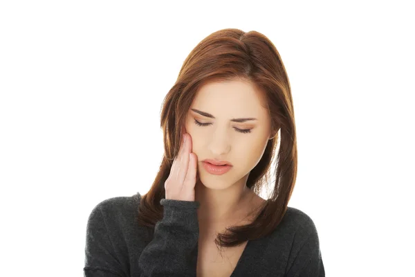 Adolescente mujer teniendo un terrible dolor de muelas . —  Fotos de Stock