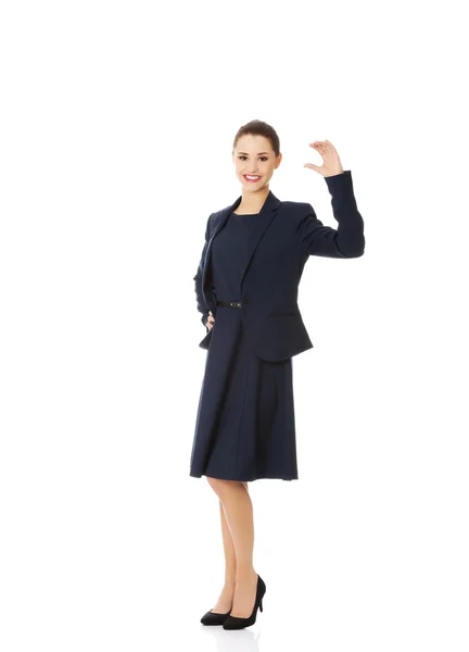 Business woman showing something or copyspase — Stock Photo, Image