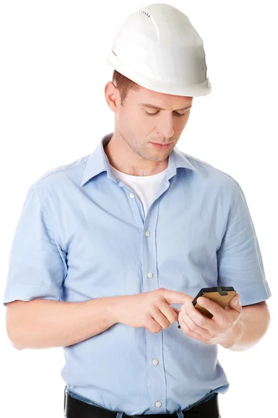 Contractor using cell phone — Stock Photo, Image