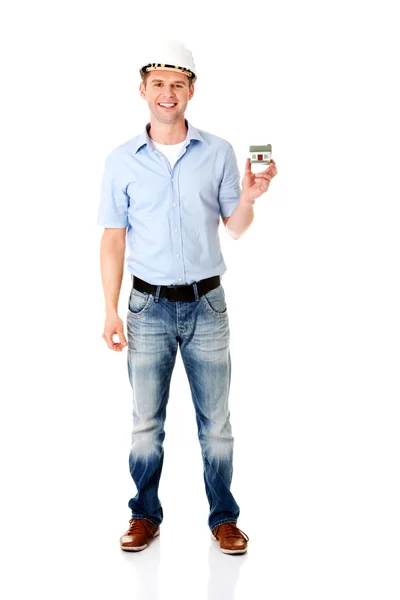 A forewoman holding a model house — Stock Photo, Image