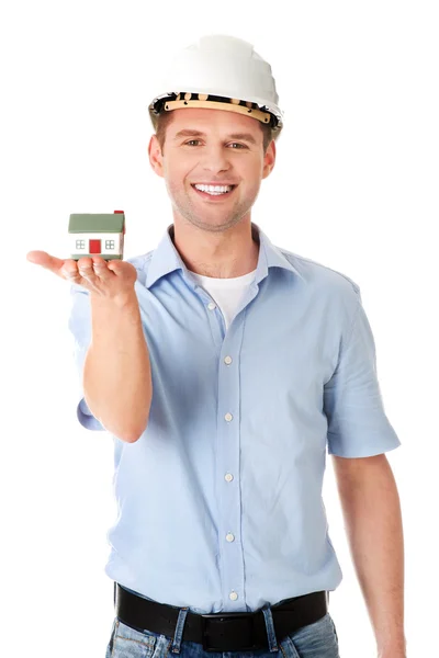 A forewoman holding a model house — Stock Photo, Image