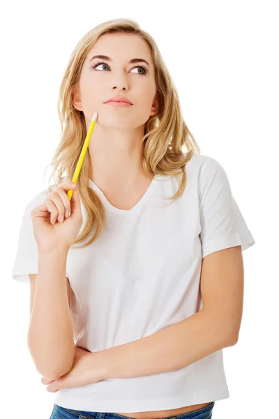 Thoughtful woman with pencil — Stock Photo, Image