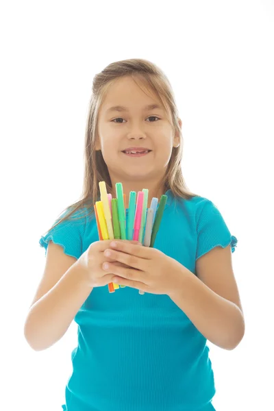 Menina segurando lápis de cor — Fotografia de Stock