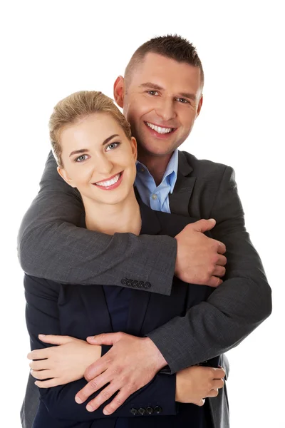 Businesspeople embracing each other — Stock Photo, Image