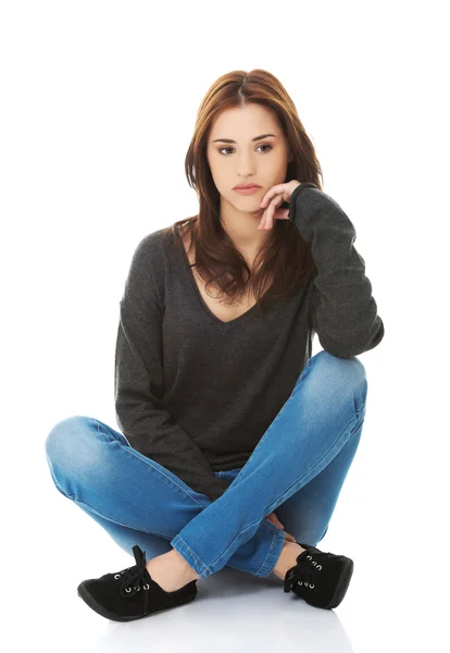 Woman sitting legged — Stock Photo, Image