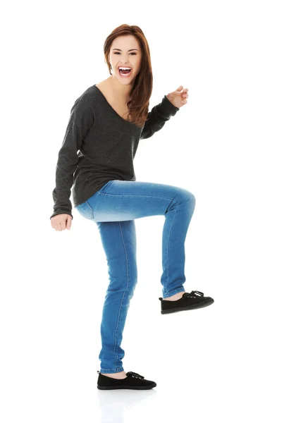 Woman dancing and laughing Stock Picture