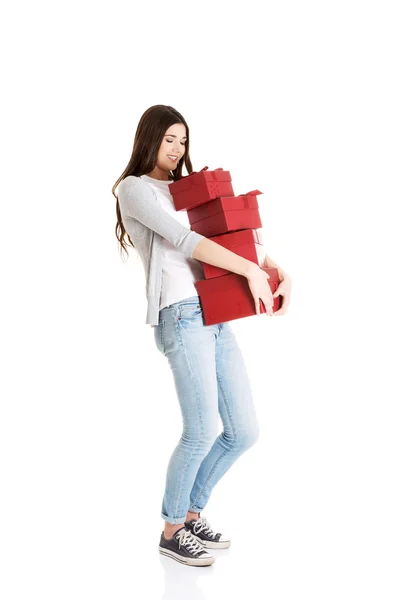 Teen holding presents — Stock Photo, Image