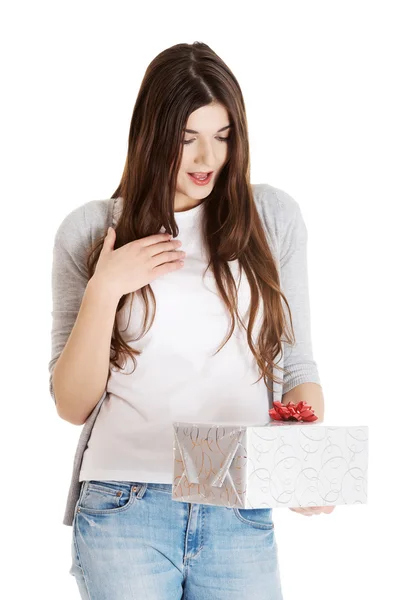 Teen holding a present — Stock Photo, Image