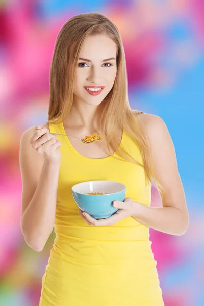 Woman eating cereal — Stock Photo, Image