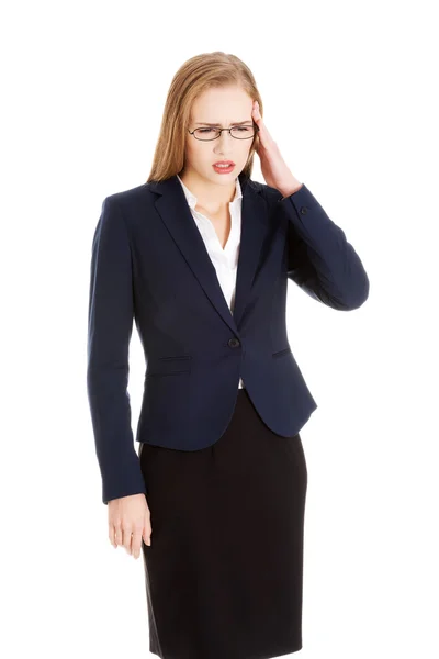 Businesswoman with a headache — Stock Photo, Image