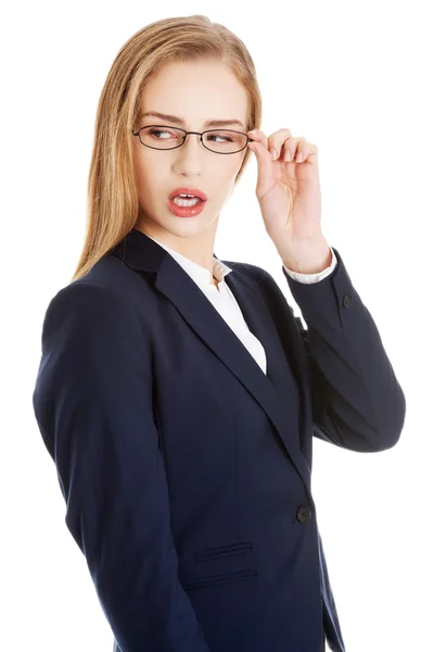 Businesswoman holding glasses — Stock Photo, Image