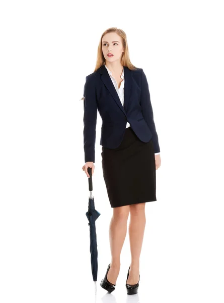 Donna d'affari con un ombrello in mano — Foto Stock