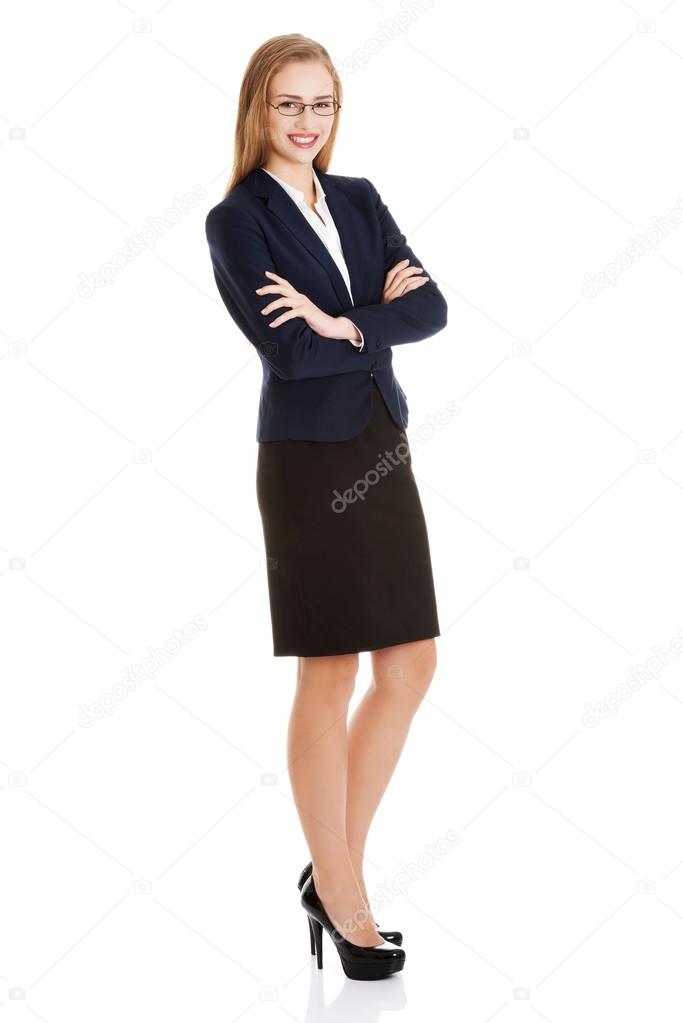 Happy businesswoman standing