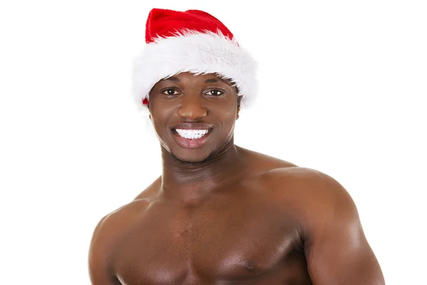 Schwarzer Mann mit Weihnachtsmütze — Stockfoto