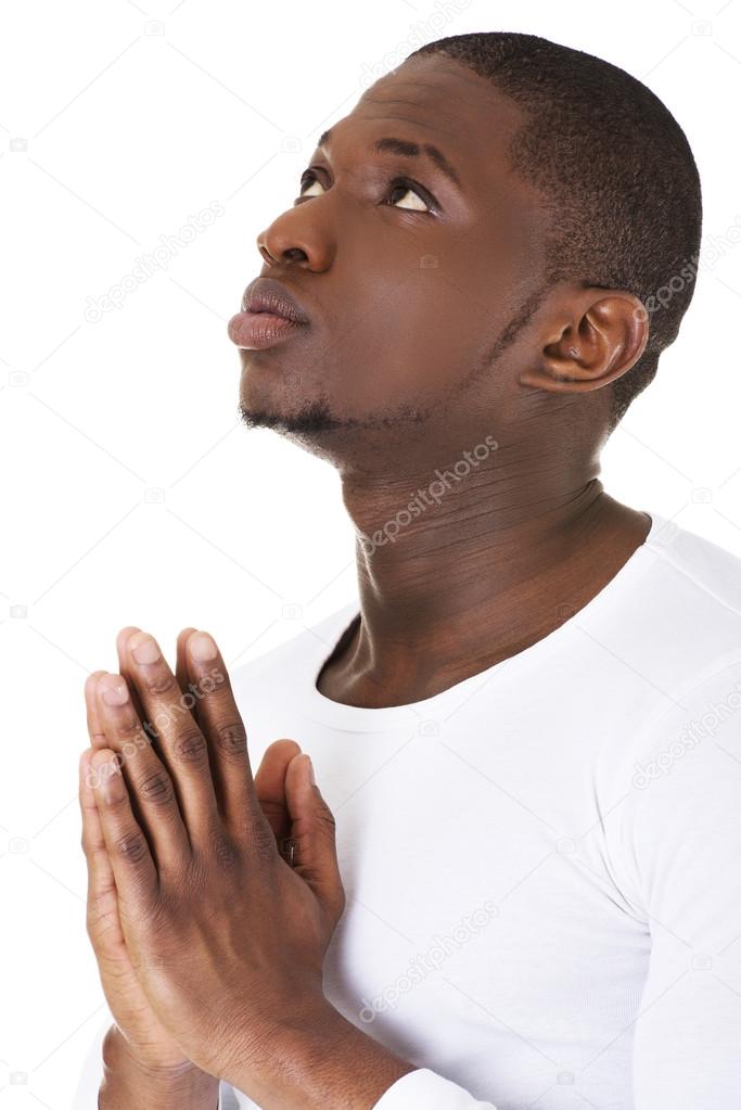 Black man praying