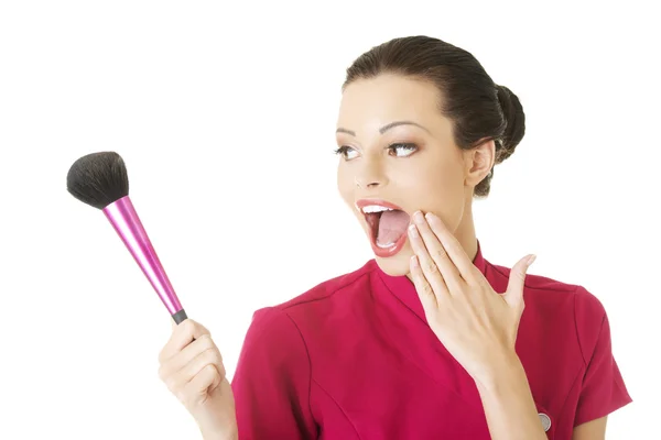 Visage artist holding brushes — Stock Photo, Image