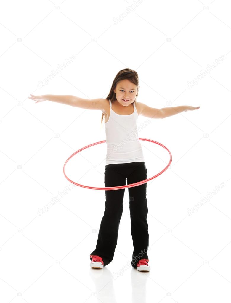 Happy girl with hula hoop
