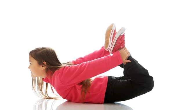 Meisje je gymnastiek oefening doet — Stockfoto