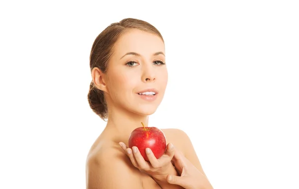 Mujer desnuda sosteniendo una manzana — Foto de Stock