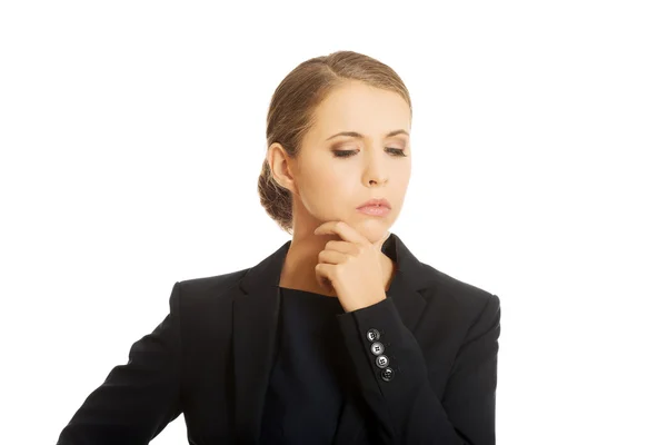 Businesswoman thinking about an idea — Stock Photo, Image