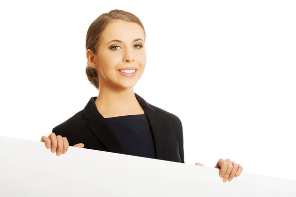 Woman holding white banner — Stock Photo, Image