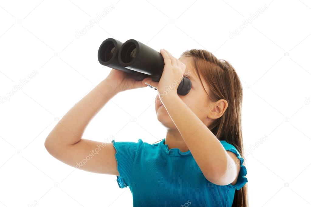 Happy girl with binoculars