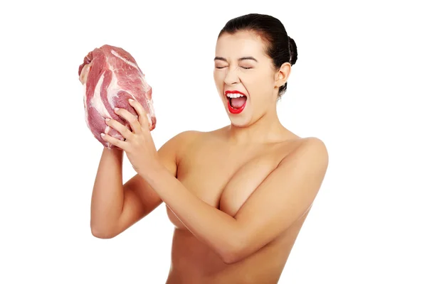 Mulher mão segurando carne — Fotografia de Stock