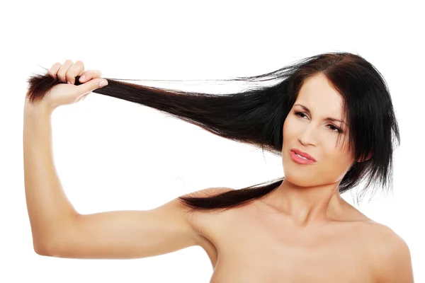 Woman pulling hair — Stock Photo, Image