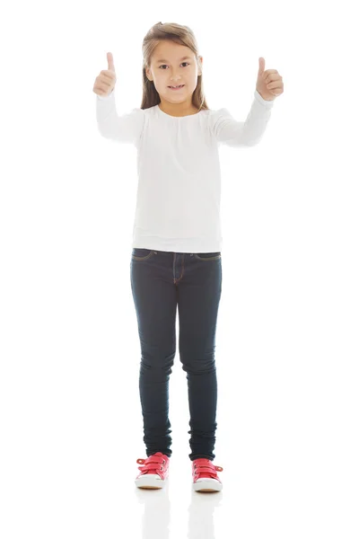 Little girl gesturing thumbs up — Stock Photo, Image