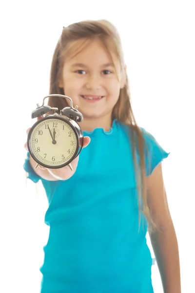 Menina segurando o relógio — Fotografia de Stock