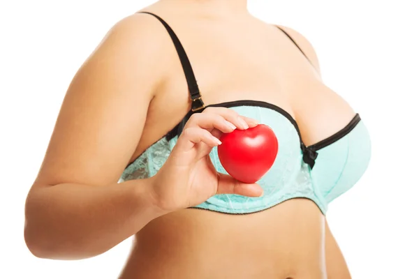 Woman holding heart model — Stock Photo, Image