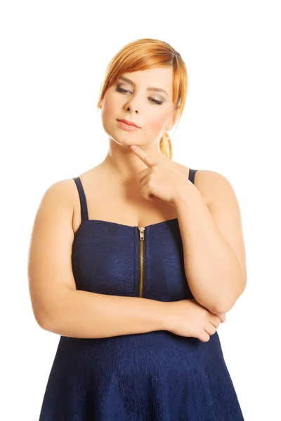 Riflessivo plus size donna — Foto Stock