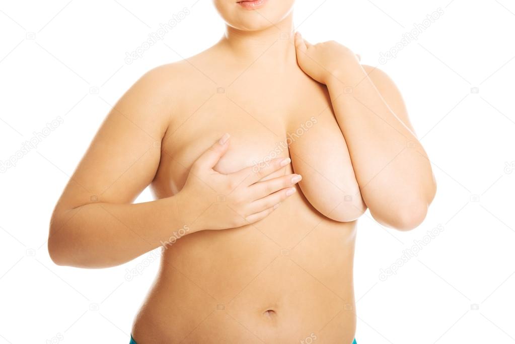 Woman covering her breast.